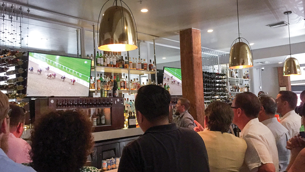 Turn Services party surrounding 'Justify' horse race