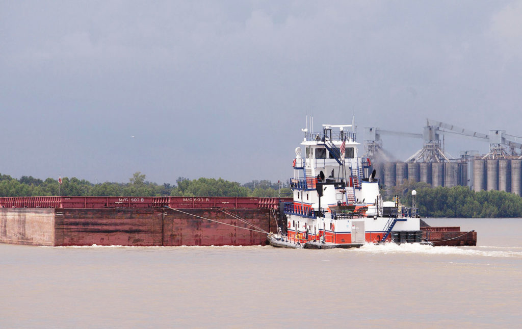 Turn Services pushboat pushing a barge